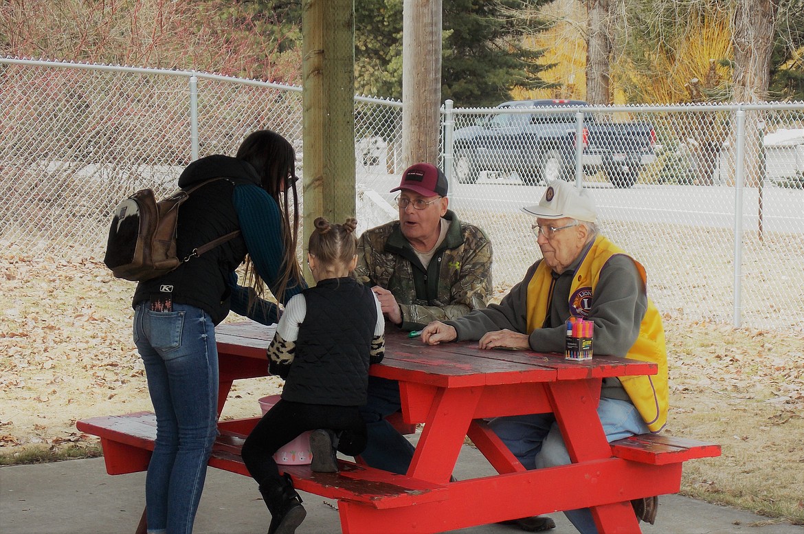 The Osburn Lion's Club and P1FCU provided $1 bills to Easter egg hunters who found special eggs. "We had around 100 people turn out for the egg hunt," said Osburn Lion's Club member Ron Hood.