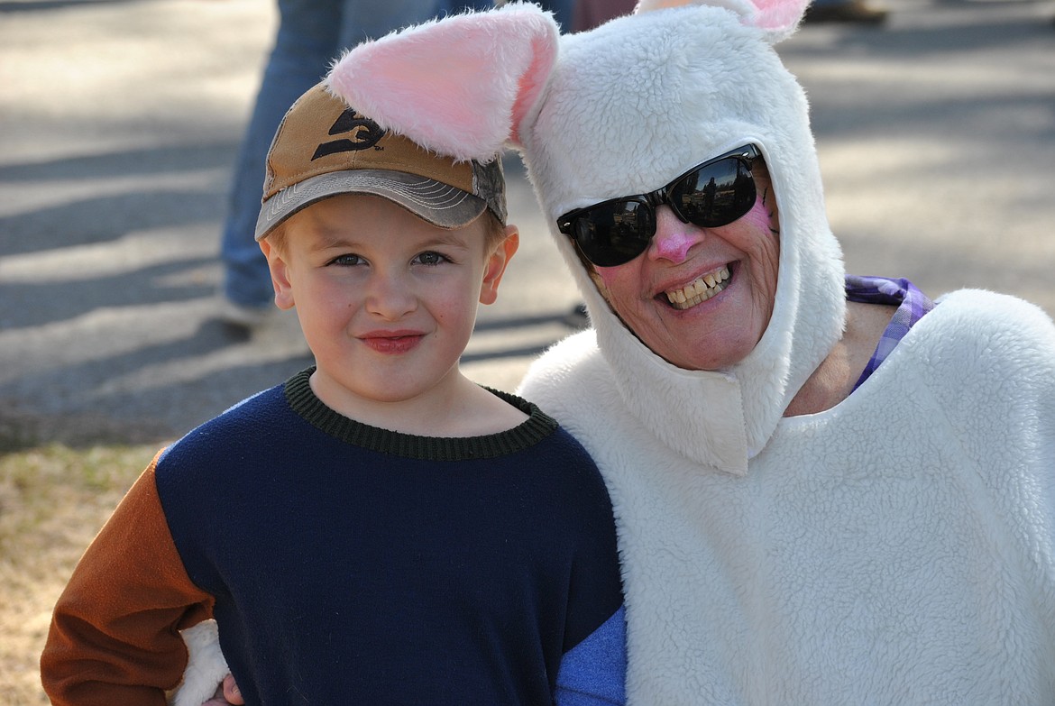 Parker Mellen stops for a quick snapshot with Rita the Easter Bunny just before the egg hunts got under way Saturday afternoon at Eva Horning Park in Superior. (Amy Quinlivan/Mineral Independent)