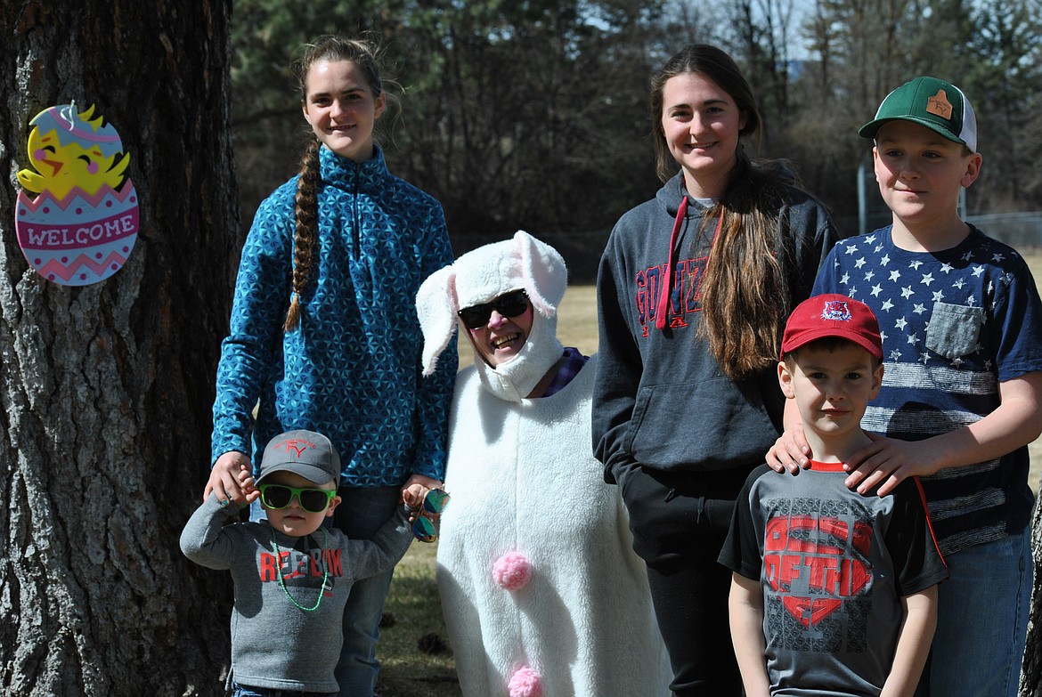 The Crabb cousins gathered together with the Easter Bunny Saturday afternoon during the annual egg hunts in the park. (Amy Quinlivan/Mineral Independent)