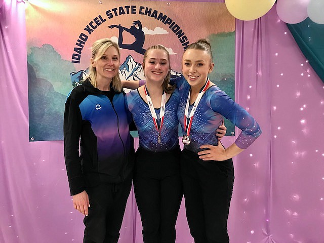 Courtesy photo
GEMS Athletic Center at the state gymnastics championships April 1-2 in Hailey. From left are coach Meloney Butcher and Senior Diamonds McKenzie Palaniuk and Taryn Olson.