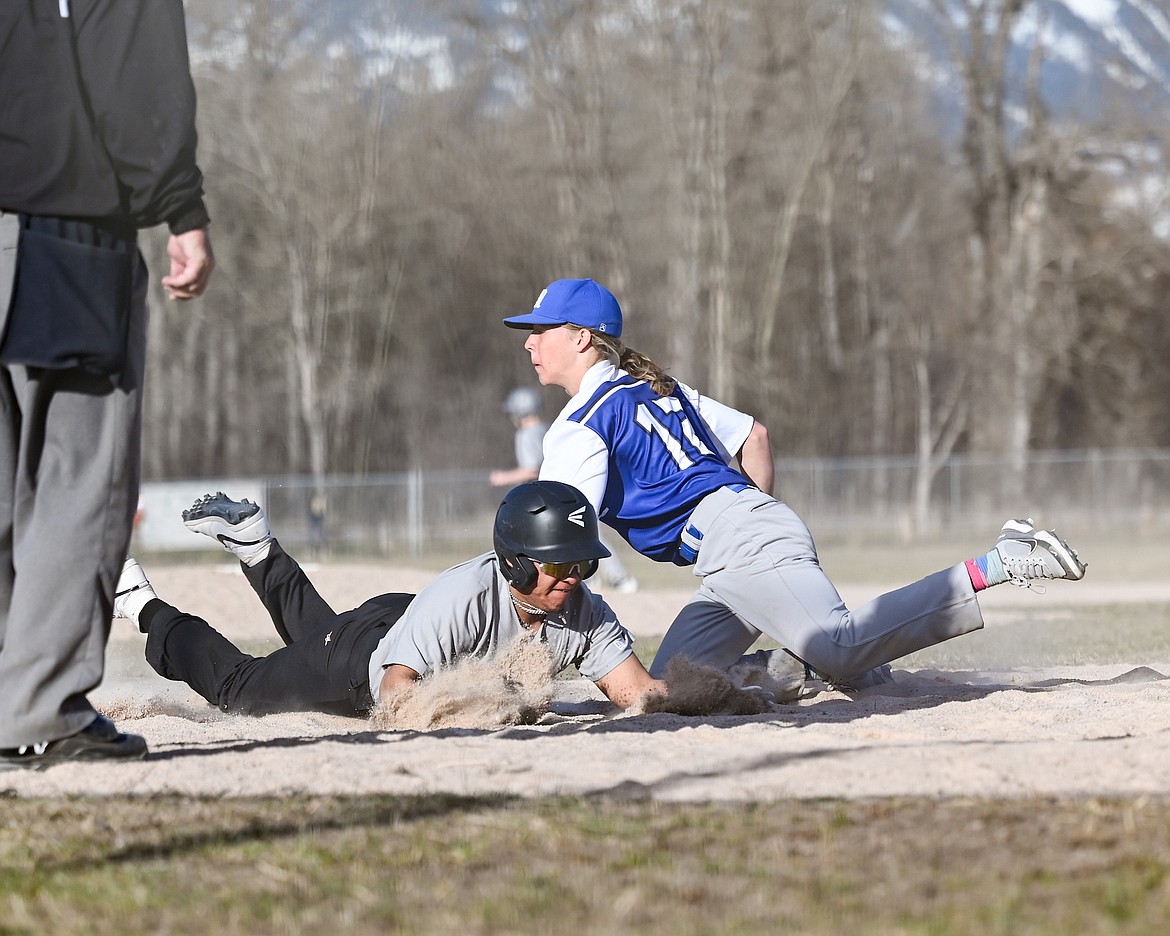 Jake Helser makes the play at home during last week's MAC-Plains contest. (Christa Umphrey photo)