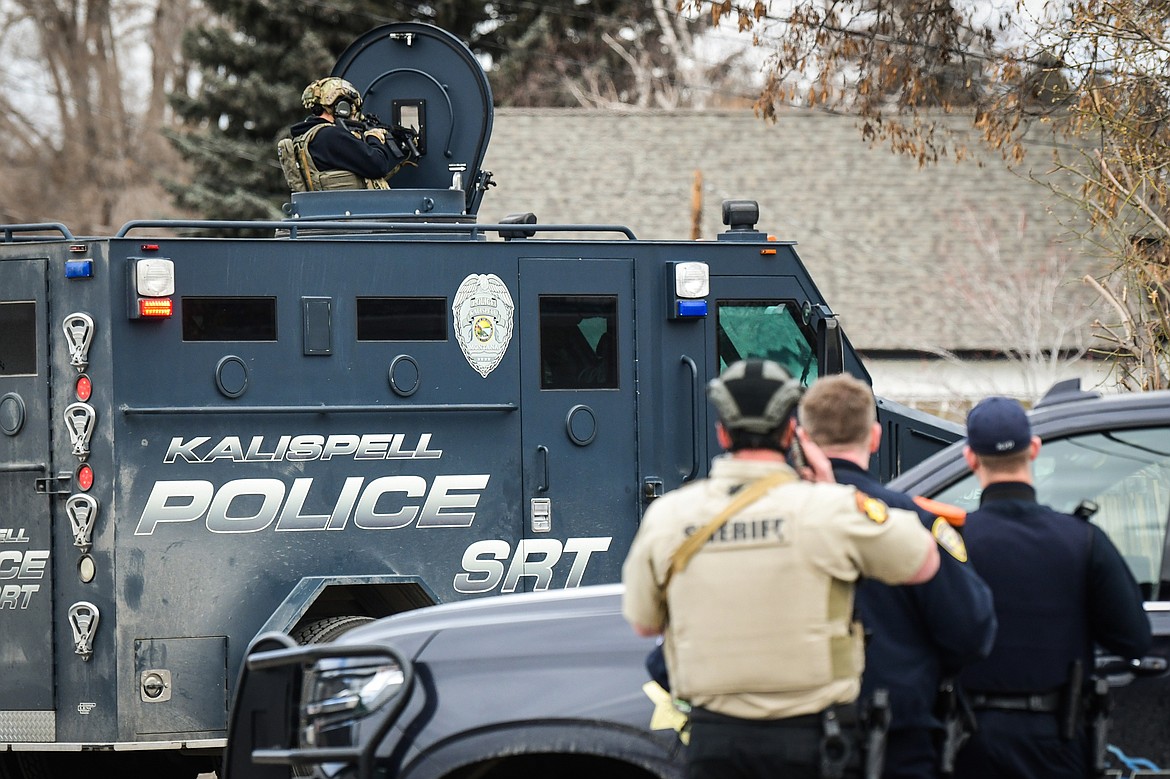 Law enforcement personnel respond to an assault with a weapon call that turned into an armed standoff between Second and Third Avenue West North in Kalispell on Tuesday, April 11. (Casey Kreider/Daily Inter Lake)