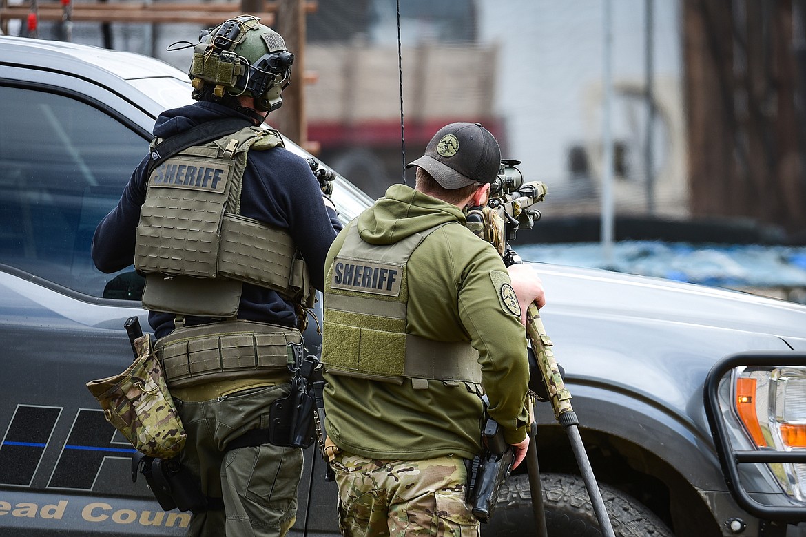 Law enforcement personnel respond to an assault with a weapon call that turned into an armed standoff between Second and Third Avenue West North in Kalispell on Tuesday, April 11. (Casey Kreider/Daily Inter Lake)