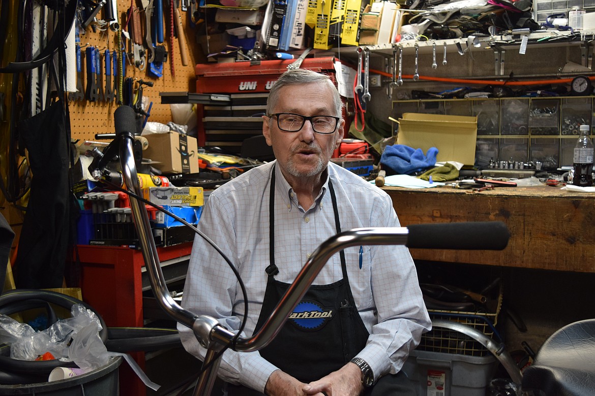 Bill Spark, owner of The Bicycle Shop in Moses Lake, in the back with a big adult tricycle he’s just put together. Spark said early spring is the start of the shop’s busy season, when the shop will be full of cyclists needing repairs, tune-ups and wanting to buy new bicycles.