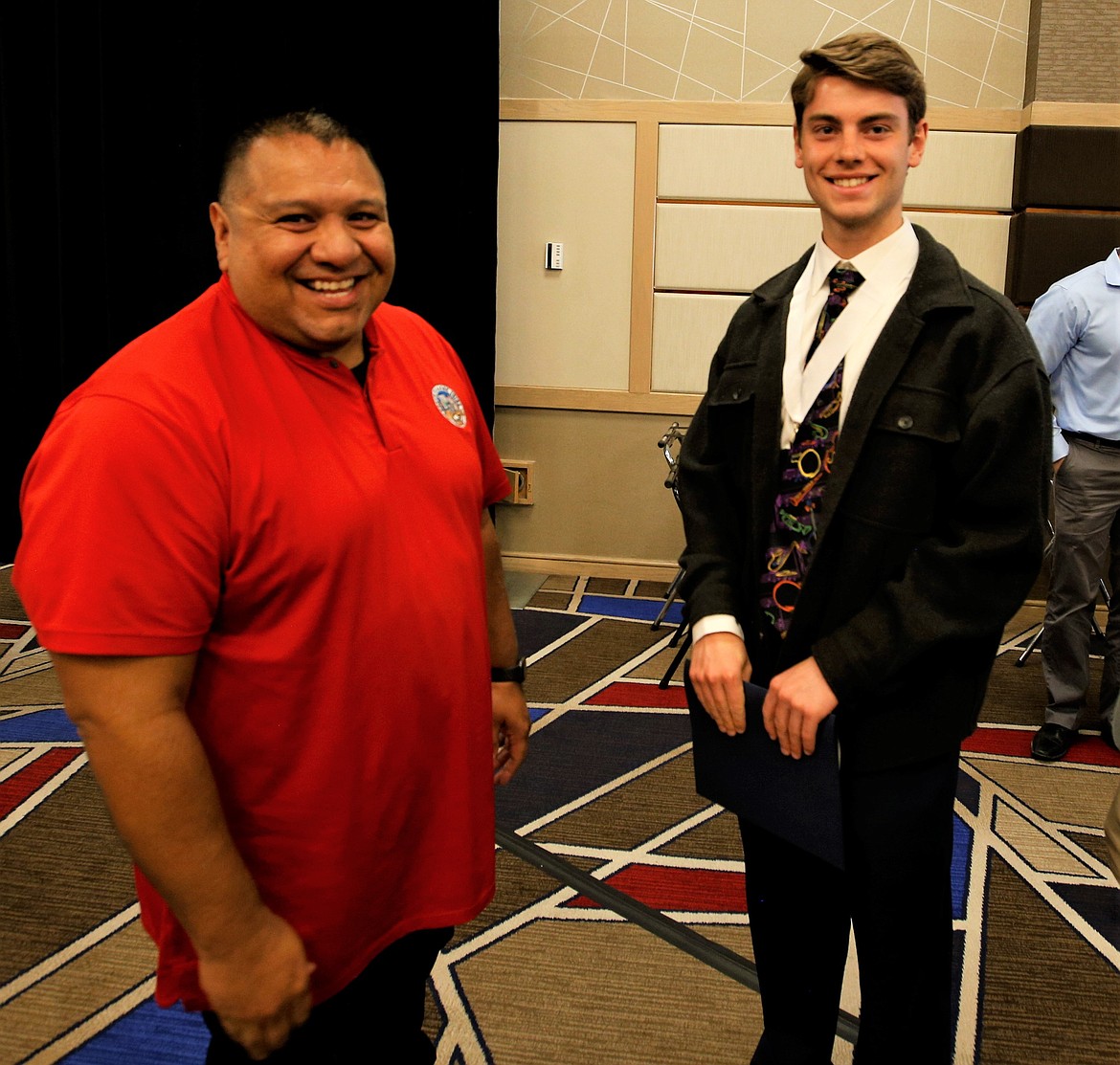 Coeur d'Alene Tribe Chairman Chief Allan chats with a student following the Coeur d'Alene Regional Chamber's scholarship breakfast at The Coeur d'Alene Resort on Tuesday.