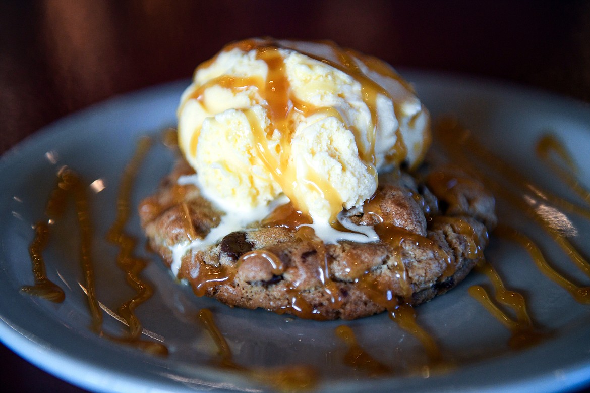 A homemade chocolate chip cookie with a scoop of ice cream at Nickerbokker's Pizza in Kalispell on Wednesday, April 12. (Casey Kreider/Daily Inter Lake)