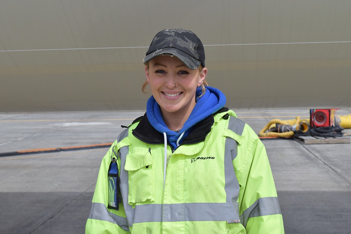 Kandyce Pratt, an aircraft mechanic for Boeing, besides one of the company’s 737 MAX aircraft currently stored in Moses Lake. Pratt and her husband Ed Connor, who also works for Boeing, relocated to Moses Lake from the West Side. 
“This feels like home now. We both want to stay,” she said.