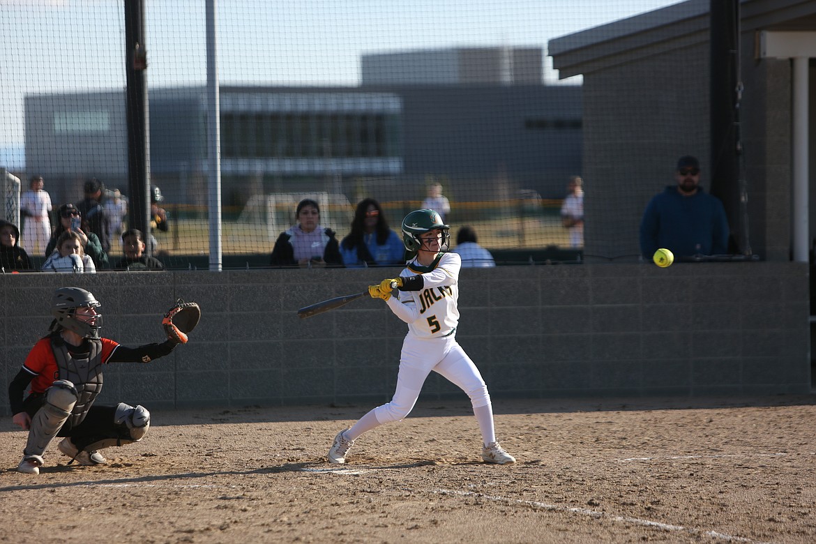 Quincy sophomore Myka Hinojosa looks at a pitch during the Jacks’ 8-7 win over Cashmere on Tuesday.