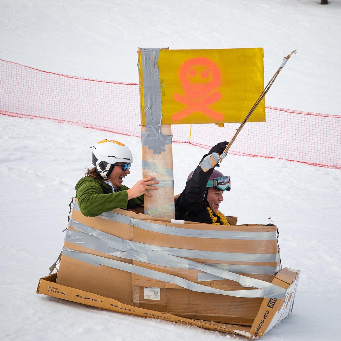 The snowy slopes of Lookout Pass provide the perfect backdrop for the cardboard box derby.