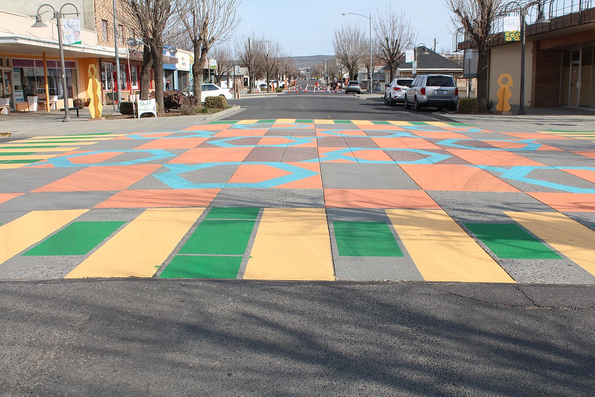 A design of blue and orange, yellow and green has been added to Central Avenue South in Quincy as part of efforts to revitalize the street.