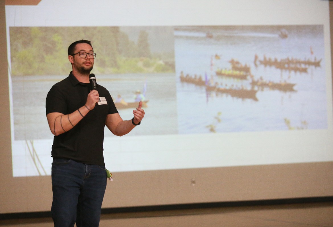 Peter Mahoney, Coeur d'Alene Tribe Cultural Resources and Protection program manager, discusses Thursday the importance of canoes to the Coeur d'Alene people as he speaks to sixth graders at Lakes Middle School.