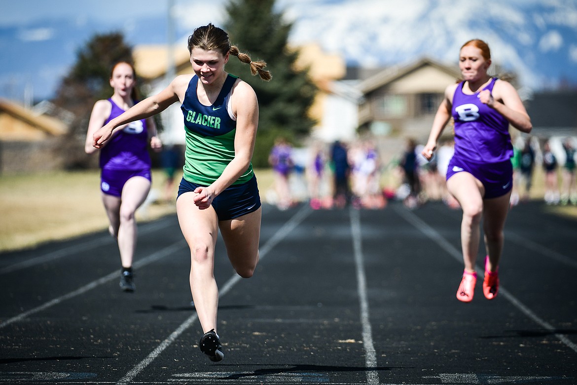 Glacier's Noah Fincher took first place in the 100 meter dash during a dual track meet with Butte at Glacier High School on Friday, April 14. (Casey Kreider/Daily Inter Lake)