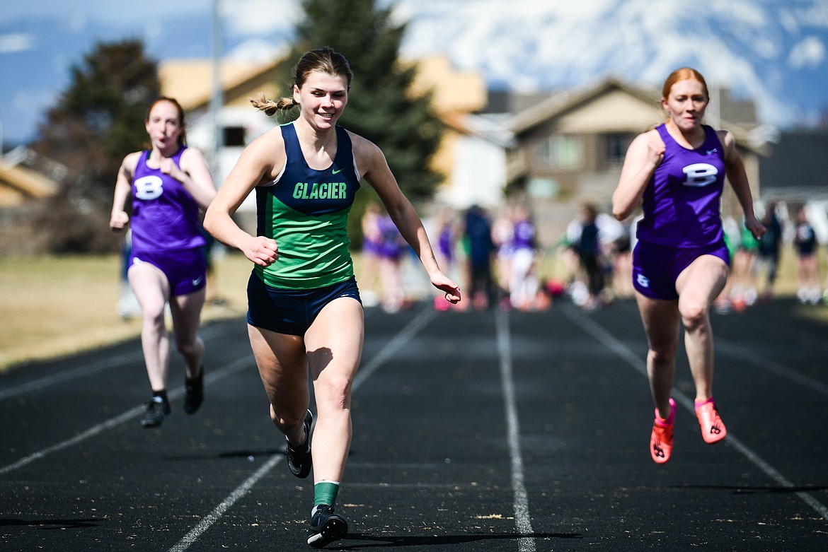 Glacier's Noah Fincher took first place in the 100 meter dash during a dual track meet with Butte at Glacier High School on Friday, April 14. (Casey Kreider/Daily Inter Lake)