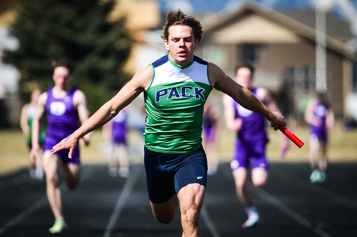 Glacier's Jackson Hensley heads to the finish line anchoring the Wolfpack boys 400 meter relay team during a dual track meet with Butte at Glacier High School on Friday, April 14. (Casey Kreider/Daily Inter Lake)