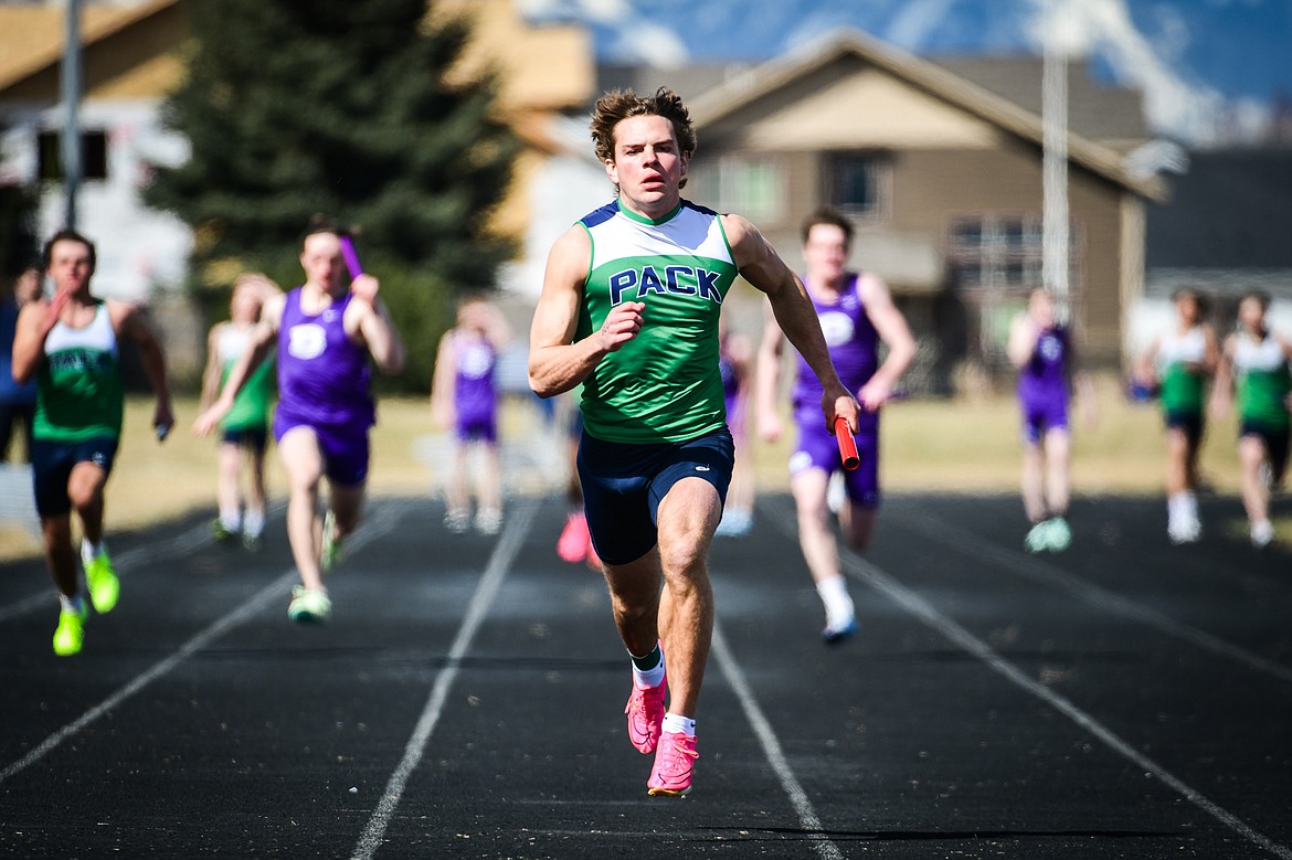 Glacier's Jackson Hensley heads to the finish line anchoring the Wolfpack boys 400 meter relay team during a dual track meet with Butte at Glacier High School on Friday, April 14. (Casey Kreider/Daily Inter Lake)