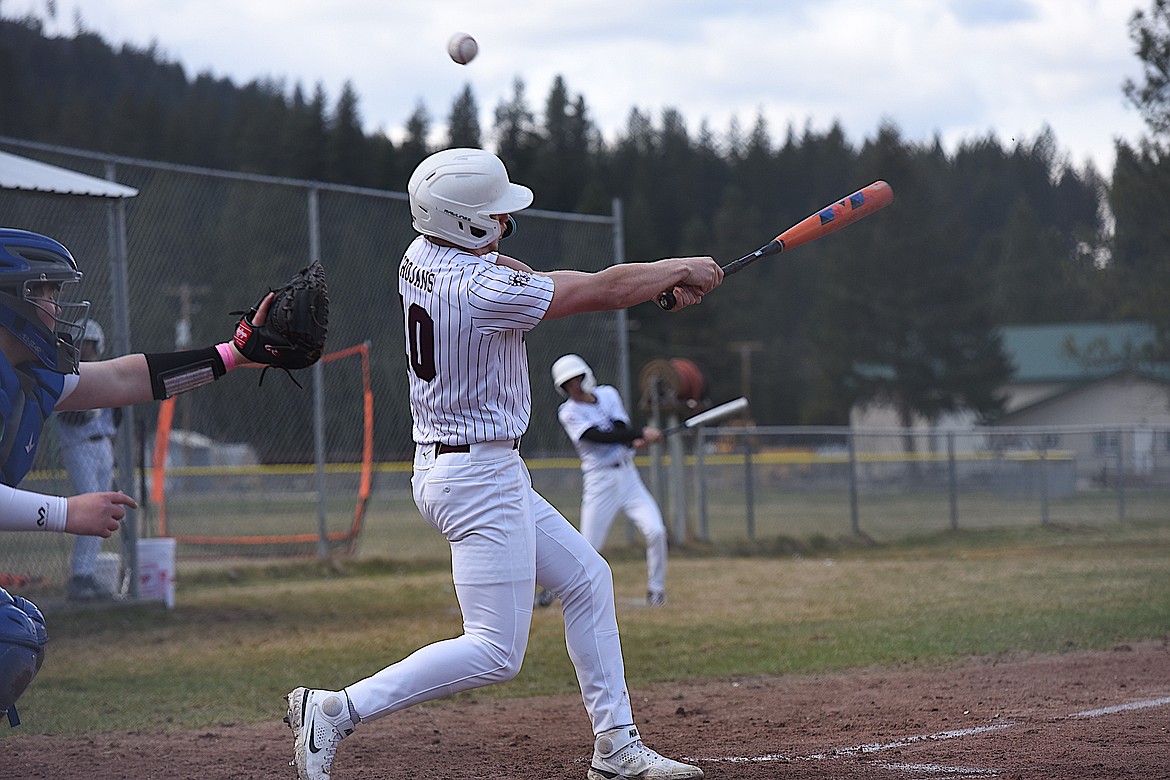 Troy third baseman Trevor Grant fouls off a pitch against Mission on Thursday, April 13, 2023. (Scott Shindledecker/The Western News)