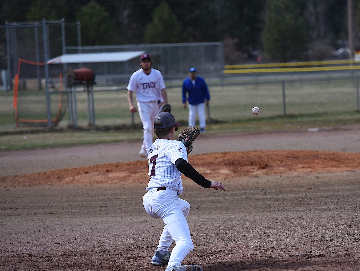 Troy first baseman Cody Todd fields a throw against Mission on Thursday, April 13, 2023. (Scott Shindledecker/The Western News)