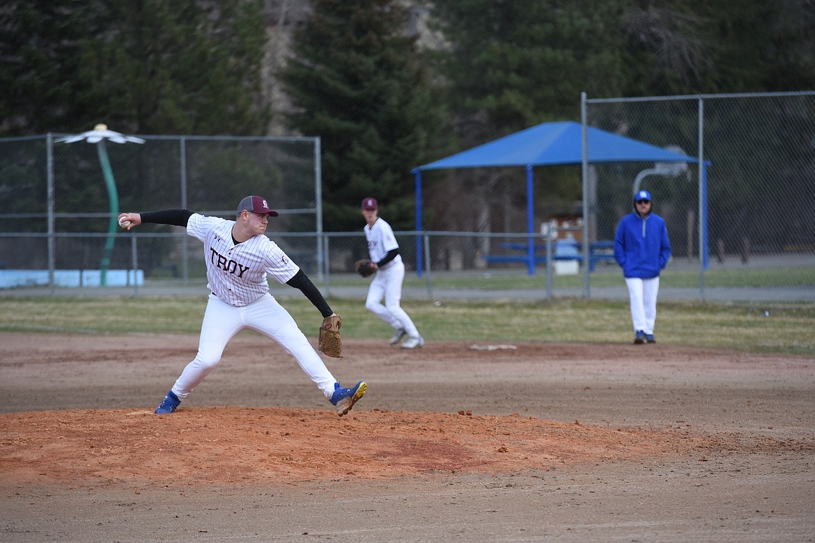 Troy relief pitcher Derek Cole delivers against Mission on Thursday, April 13, 2023. (Scott Shindledecker/The Western News)