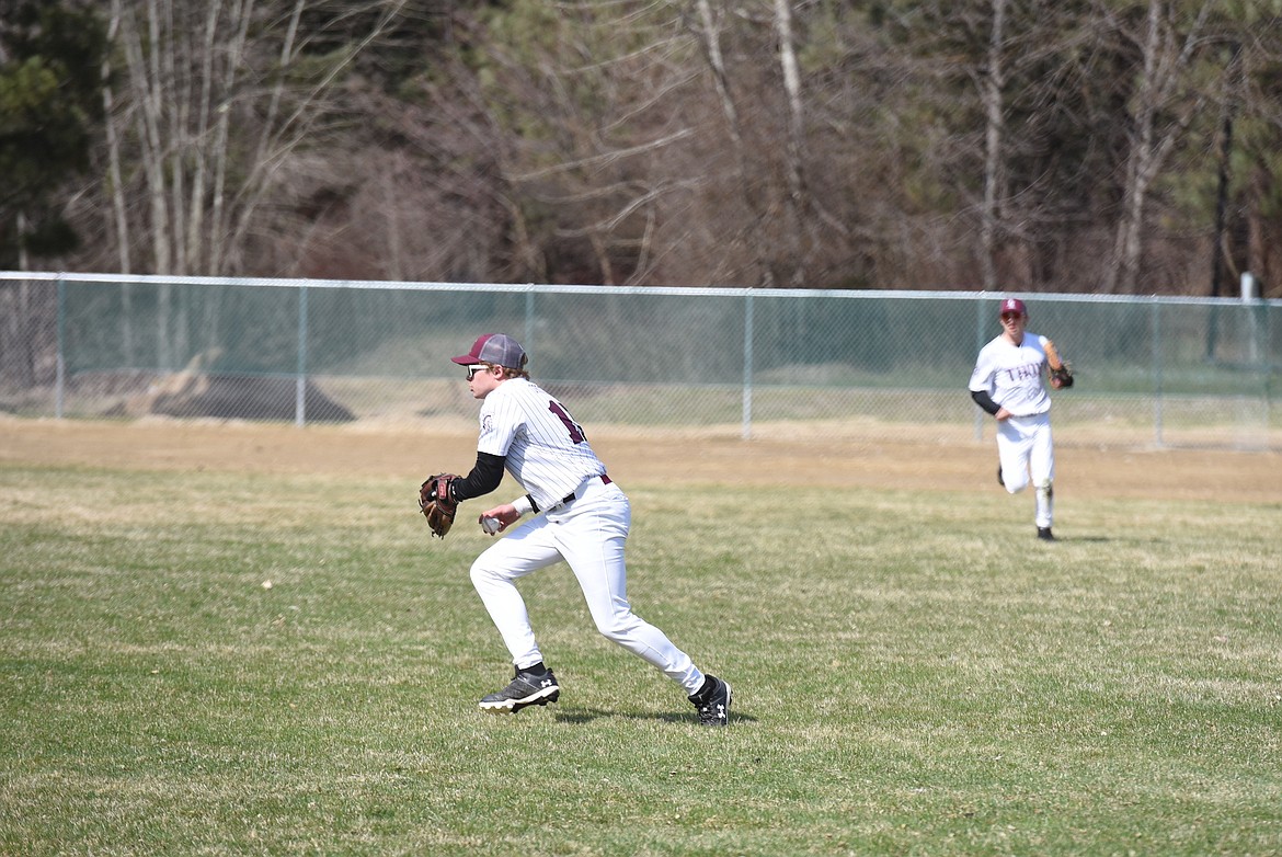 Troy right fielder Gunner Weaver prepares to throw the ball to an infielder against Mission on Thursday, April 13, 2023. (Scott Shindledecker/The Western News)