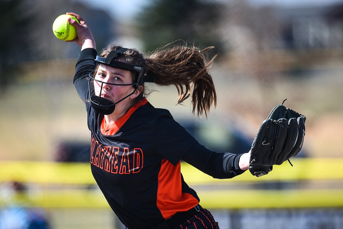 Flathead starting pitcher Ava Besson (16) delivers in the first inning against Helena at Kidsports Complex on Saturday, April 15. (Casey Kreider/Daily Inter Lake)