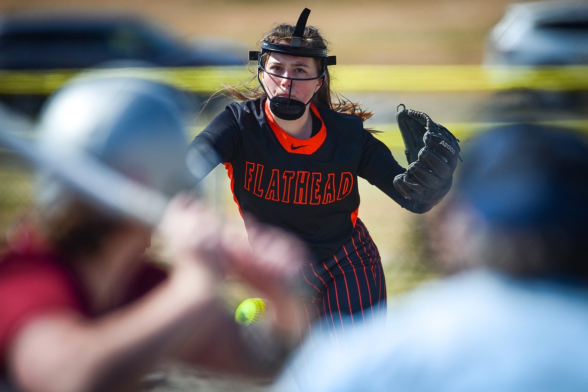 Flathead starting pitcher Ava Besson (16) delivers in the first inning against Helena at Kidsports Complex on Saturday, April 15. (Casey Kreider/Daily Inter Lake)