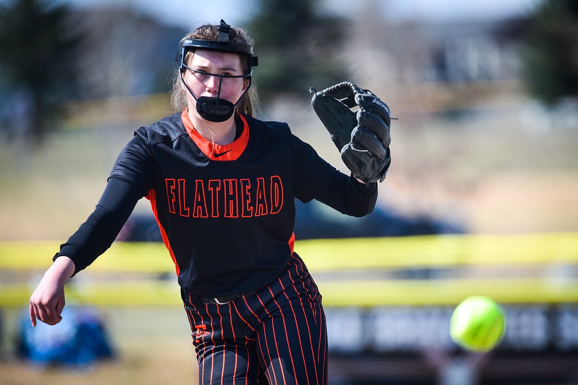 Flathead starting pitcher Ava Besson (16) delivers in the first inning against Helena at Kidsports Complex on Saturday, April 15. (Casey Kreider/Daily Inter Lake)