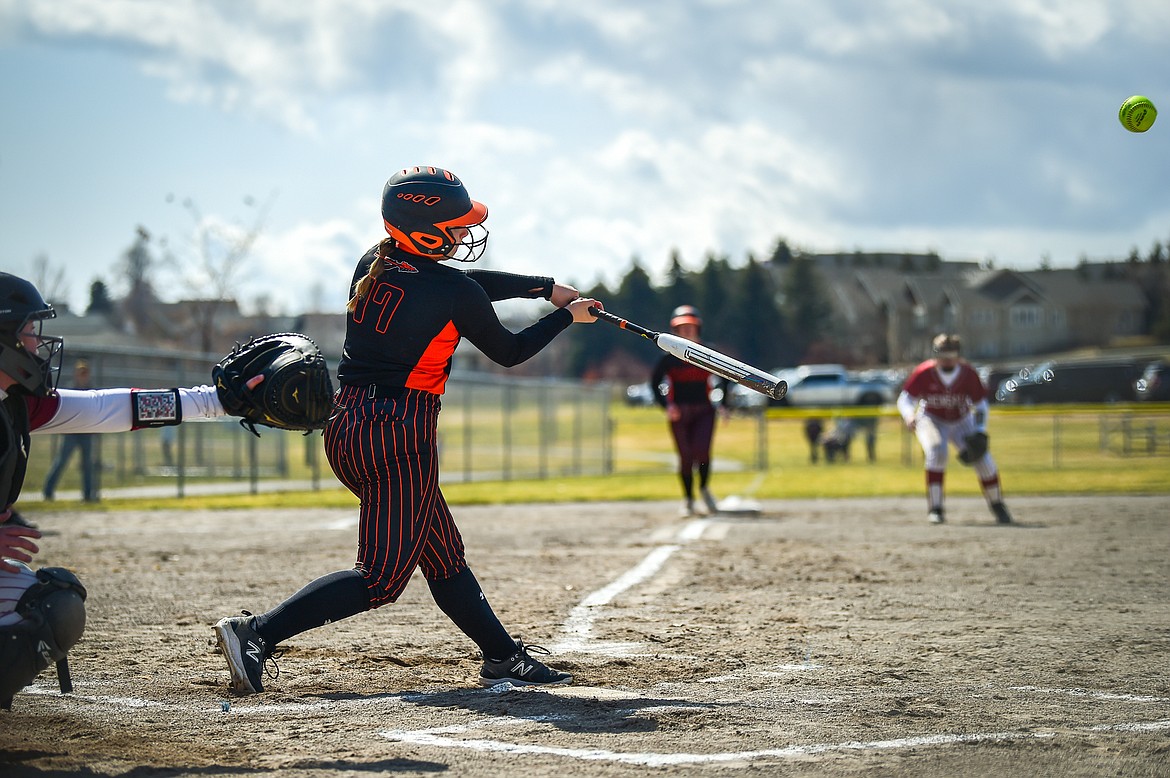 Flathead's Reese Conley (17) connects on a two-run home run to right field in the first inning against Helena at Kidsports Complex on Saturday, April 15. (Casey Kreider/Daily Inter Lake)