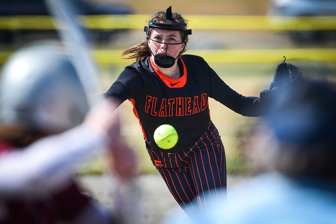 Flathead starting pitcher Ava Besson (16) delivers in the first inning against Helena at Kidsports Complex on Saturday, April 15. (Casey Kreider/Daily Inter Lake)