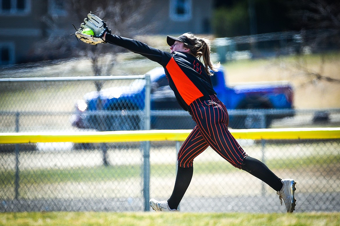 Flathead centerfielder MacKenzie Brandt (8) makes a running catch off a line drive in the fourth inning against Helena at Kidsports Complex on Saturday, April 15. (Casey Kreider/Daily Inter Lake)