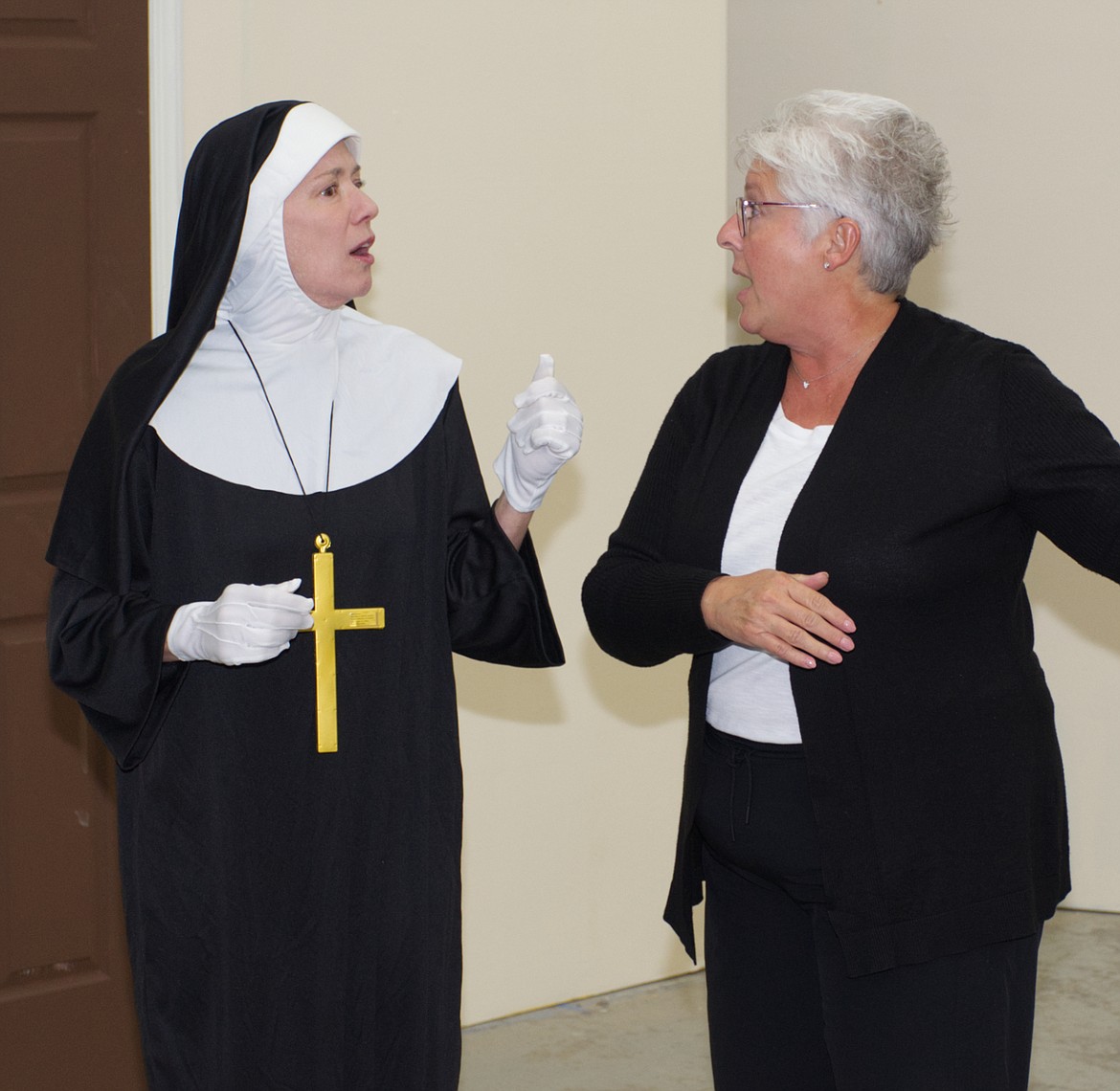 Mother Superior, played by Gina Benesh, explains to Sister Augusta played by Jodie Thole that a suspected vineyard is an orchard in the Bigfork Community Players spring production, "Drinking Habits." The play opens April 21 at the Bigfork Center for the Performing Arts. (Photo provided by Dave Vale)