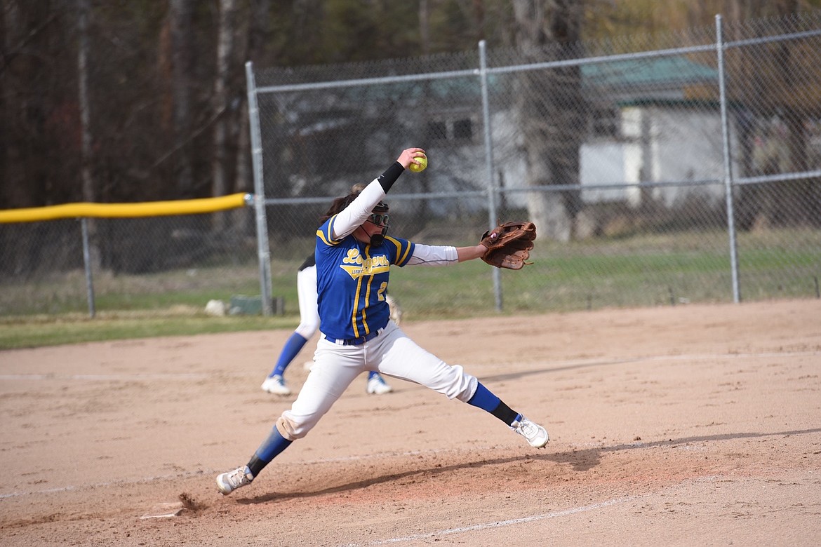 Libby's Paislee MacDonald gets ready to throw a pitch in the second game of a doubleheader Friday, April 14 against Browning. The Lady Loggers swept both games in convincing fashion. (Scott Shindledecker/The Western News)