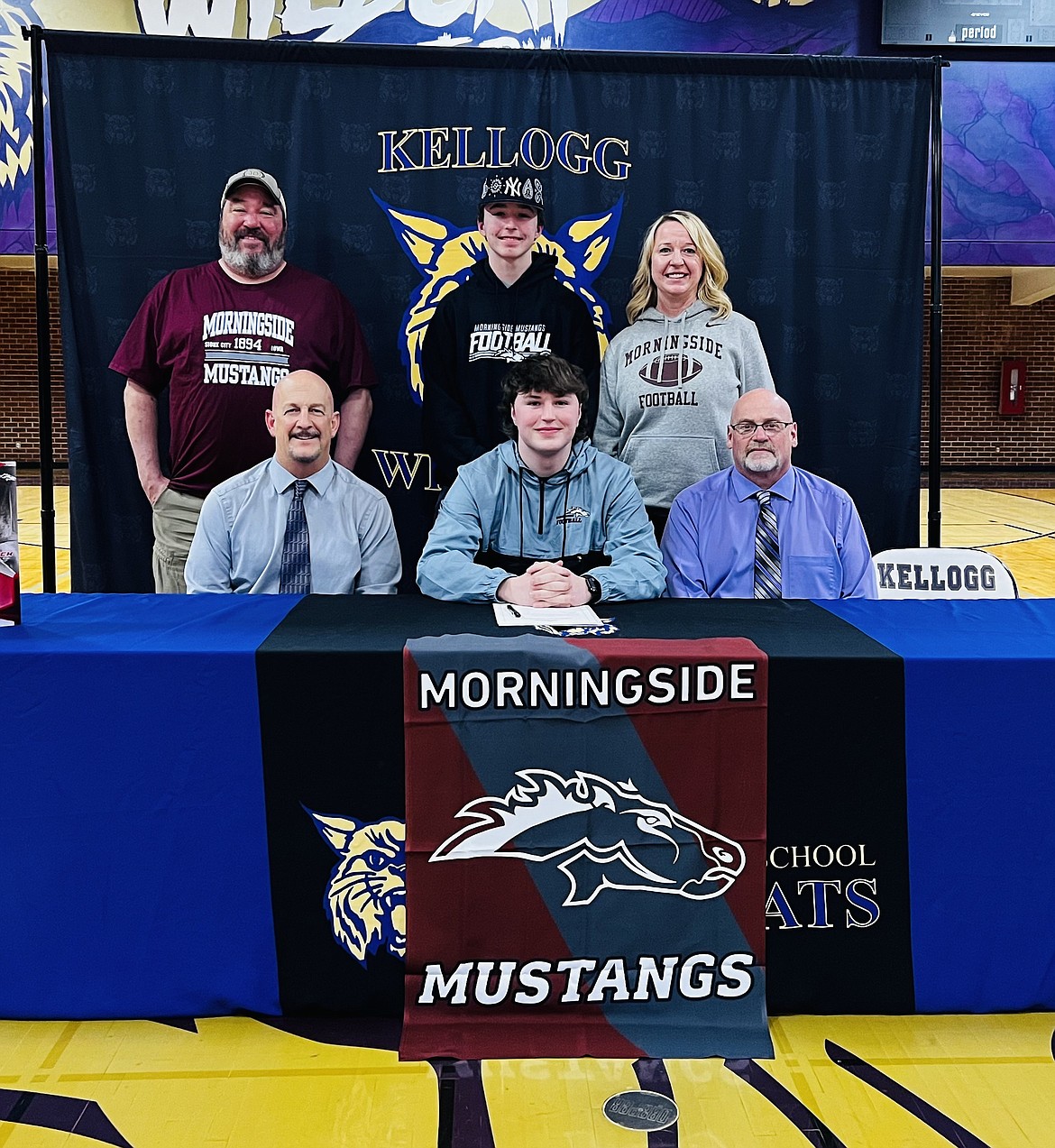 Kellogg High School football standout Varick Meredith recently signed his letter of intent to play football at Morningside University in Sioux City, Iowa. Pictured are Meredith's family members (dad) Monte, (brother) Braden and (mom) Julie. Pictured at the table is Kellogg head coach and principal Dan Davidian, Meredith and coach Tim Kimberling.