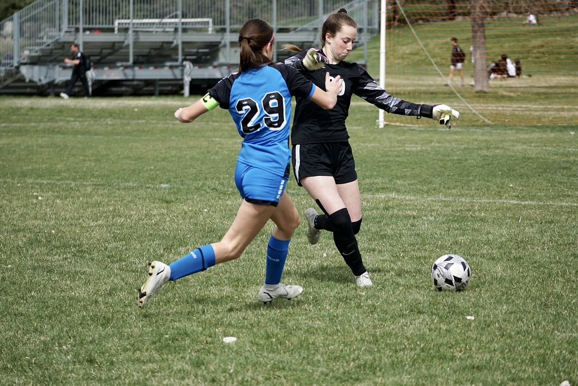 Photo by MICHAELA OBERGH
Goalie Lilliana Brinkmeier of the Thorns North FC 07G Academy works to clear the ball during a game on Sunday against Idaho Rush 07 Nero in Boise during the Idaho State Cup. The Thorns North FC 2007 Girls Academy team went undefeated for the weekend, beating Albion SC Idaho O7 3-0 and beating the Idaho Rush 07 Nero 4-0.