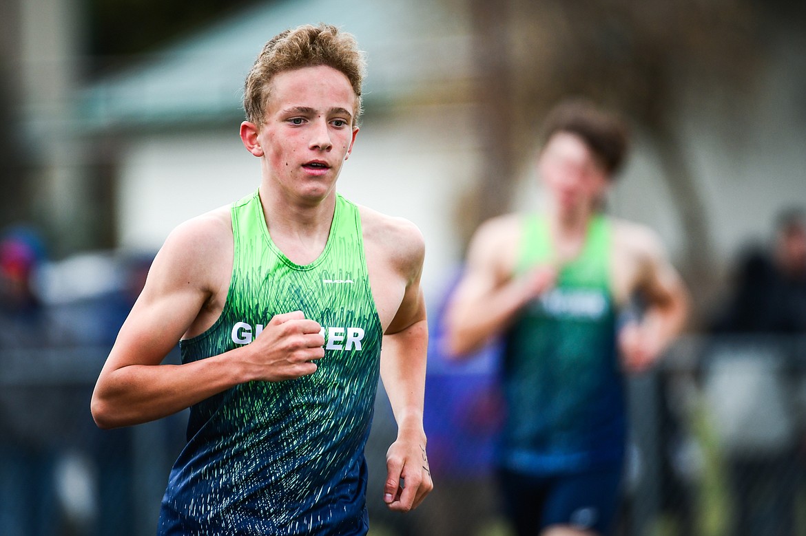 Glacier's Owen Thiel leads the 1600 meter run during a crosstown track meet with Glacier at Legends Stadium on Tuesday, April 18. (Casey Kreider/Daily Inter Lake)