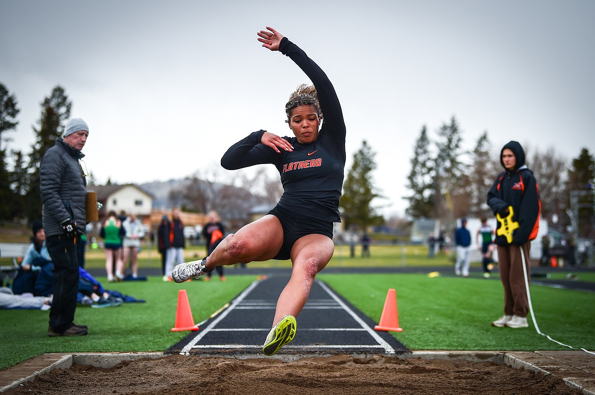 Flathead's Akilah Kubi competes in the long jump during a crosstown track meet with Glacier at Legends Stadium on Tuesday, April 18. (Casey Kreider/Daily Inter Lake)