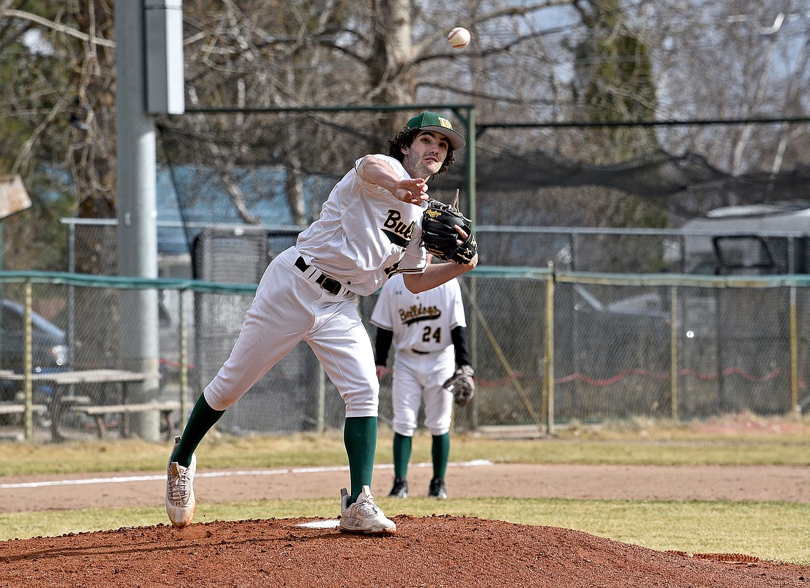 Whitefish pitcher Jacob Polumbus throws the ball to first base in an attempt to get out a runner against Butte at Memorial field on Thursday. (Whitney England/Whitefish Pilot)