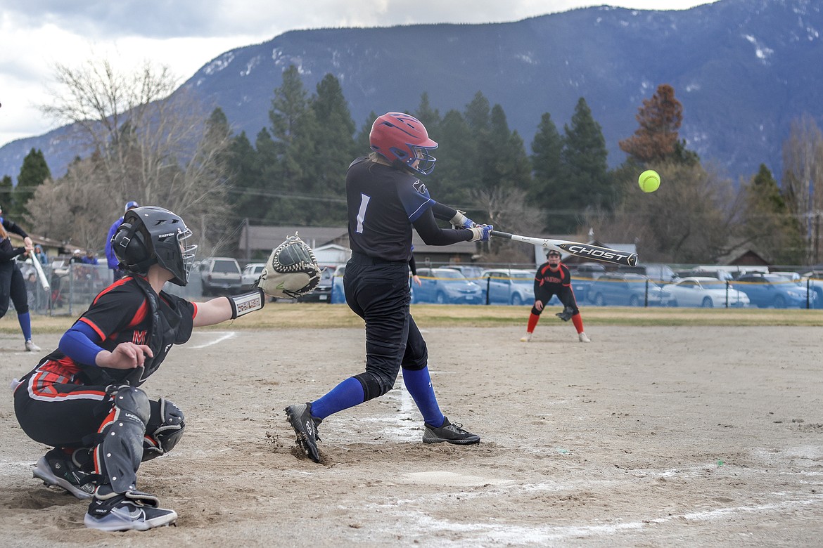 Senior Aspen Dawson hits a grand slam at home against Ronan last week. (JP Edge photo)