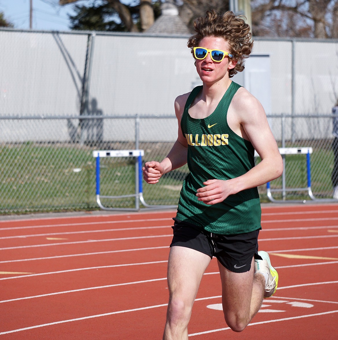 Whitefish sophomore Ethan Amick records a personal best (10:27.79) in the Men’s 3200 meter race on Saturday in Missoula. (Matt Weller photo)