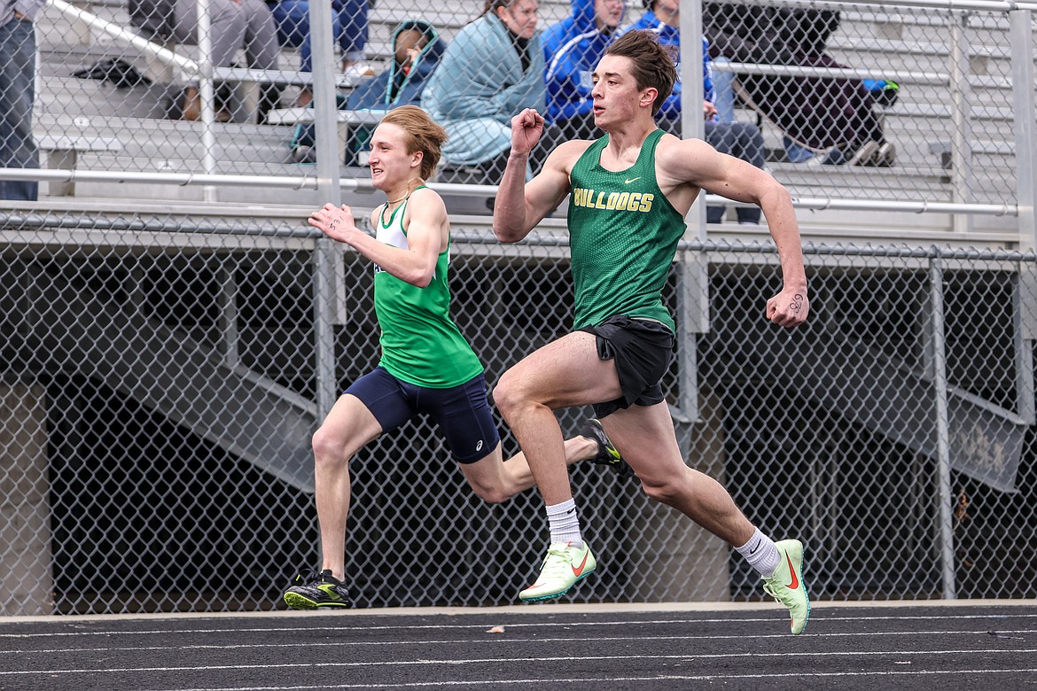 Whitefish's Riley Zetooney races in the 100 meter dash at the Flathead Time Trials last week. (JP Edge photo)