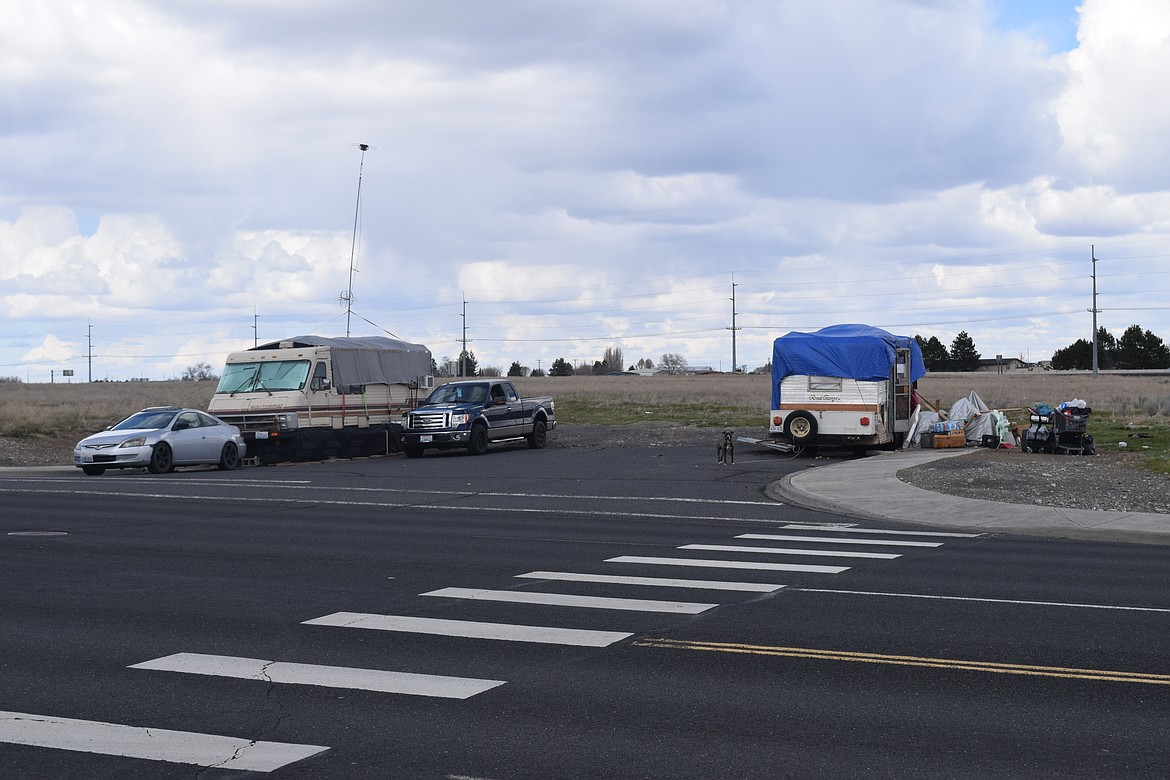 A pair of RVs parked along Central Drive across from Lauzier Field and right next to the five-acre plot where the city of Moses Lake hopes to build its next police station.