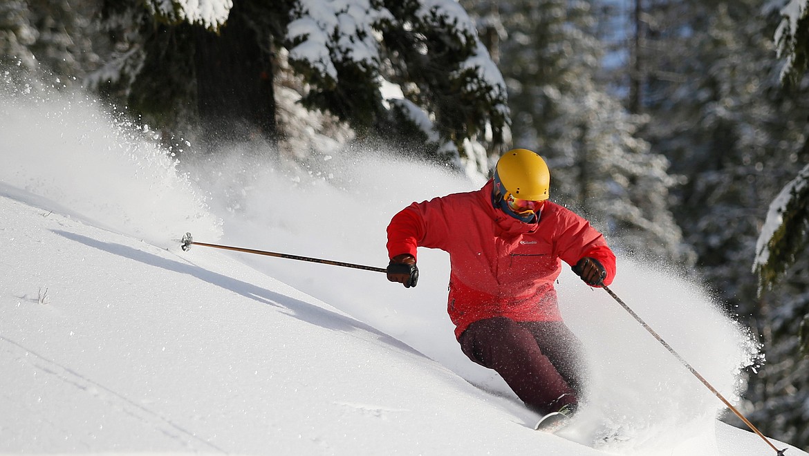 A skier cuts through the snow at Silver Mountain Resort.