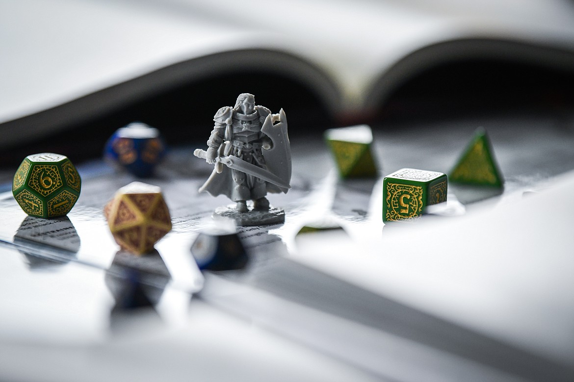Dungeons & Dragons miniatures and multi-sided die on Tuesday, April 18. (Casey Kreider/Daily Inter Lake)