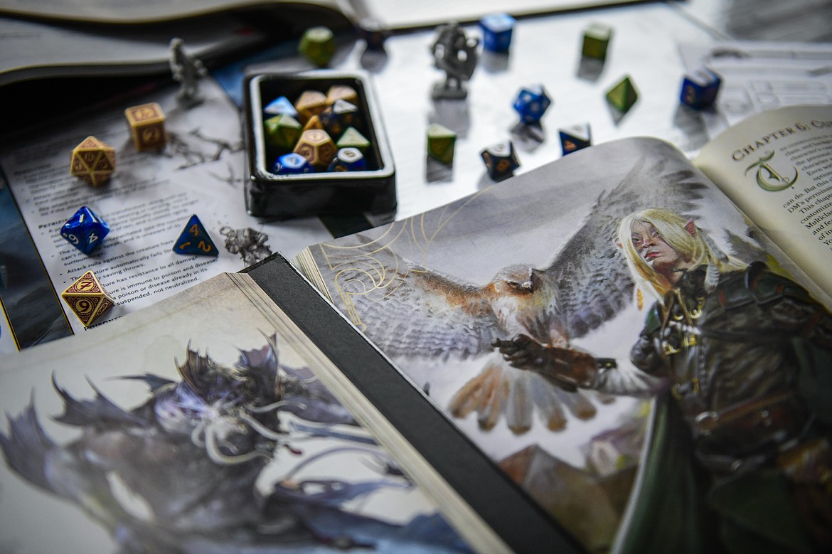 Dungeons & Dragons books, multi-sided die and miniatures on Tuesday, April 18. (Casey Kreider/Daily Inter Lake)