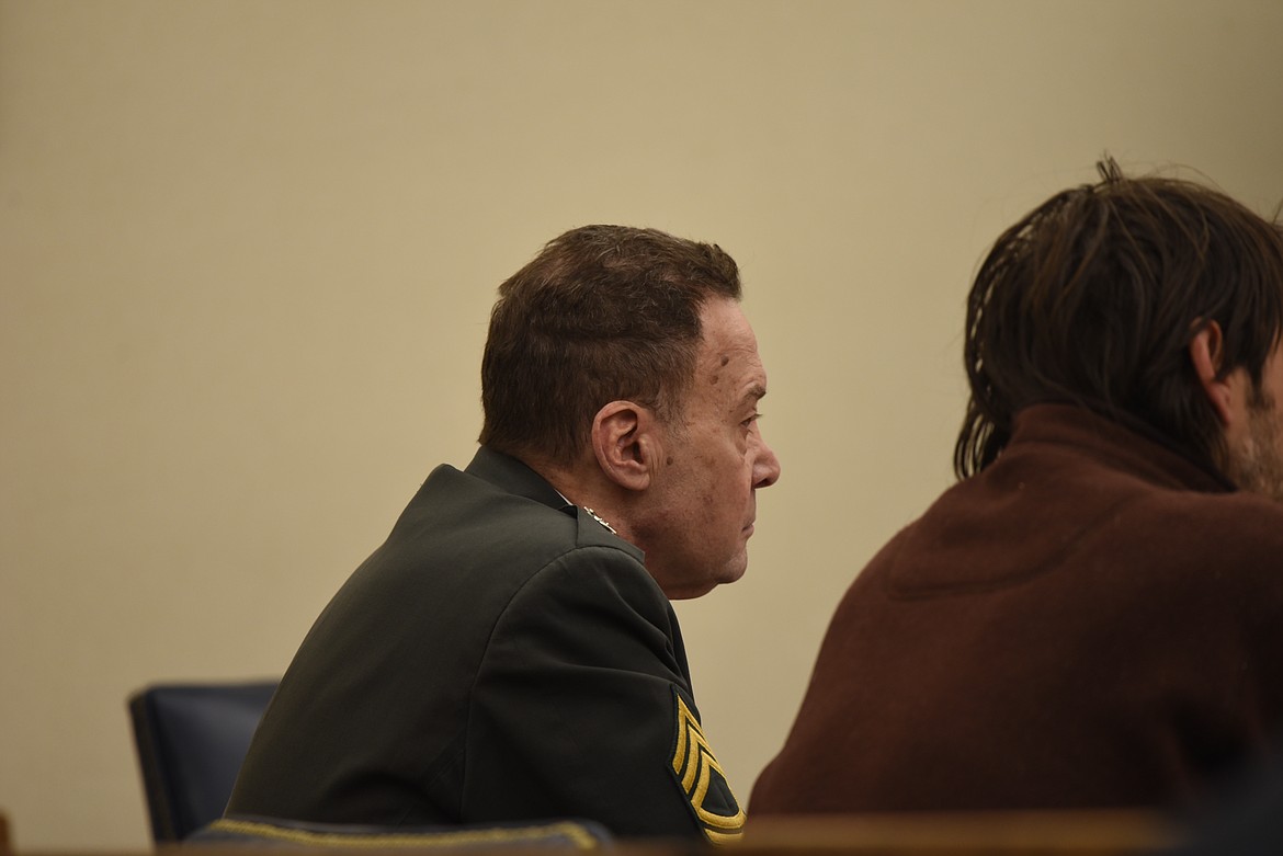 John Drew Peterson, 75, sits at the defendant's table in Flathead County District Court on Thursday, April 20, 2023. He faces one count of felony stalking. (Derrick Perkins/Daily Inter Lake)