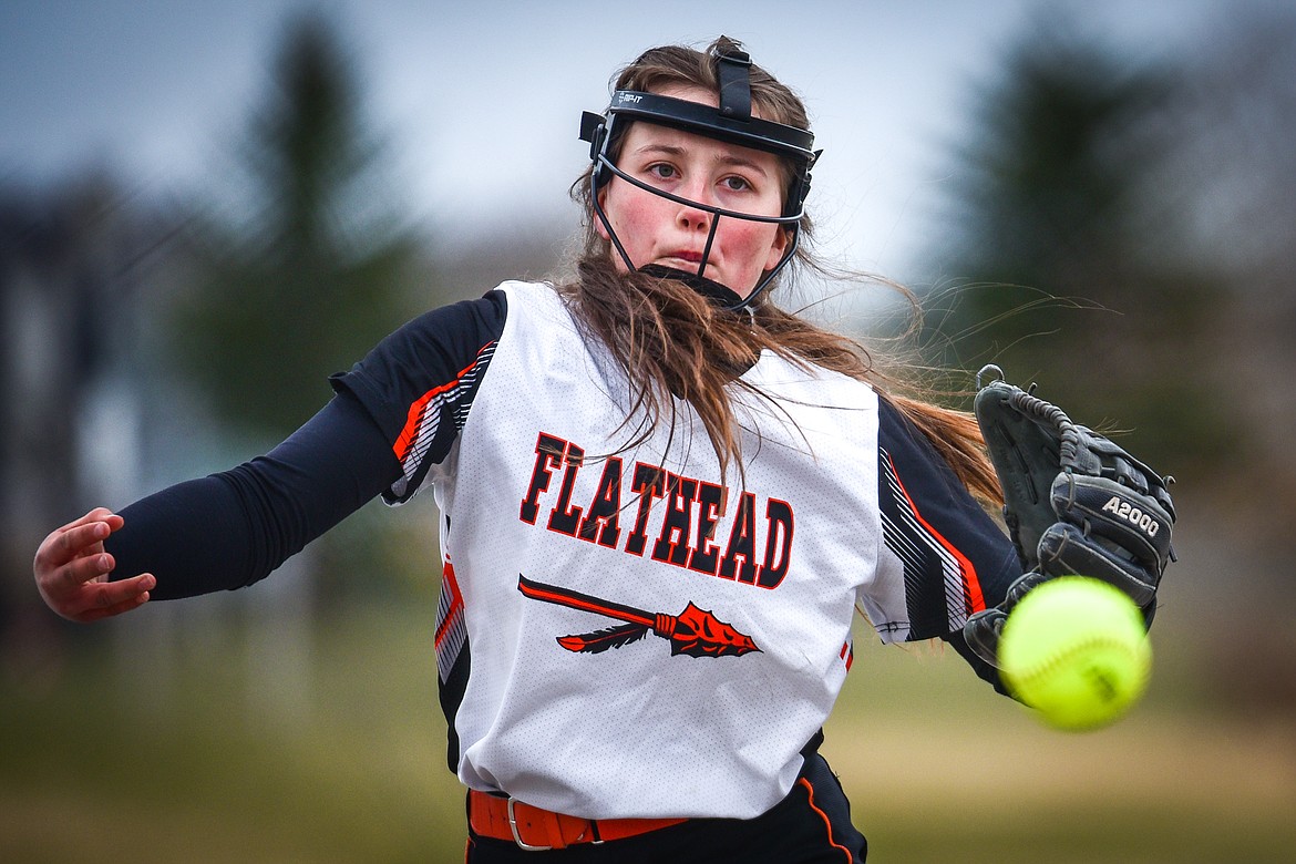 Flathead starting pitcher Ava Besson (16) delivers in the second inning against Glacier at Kidsports Complex on Thursday, April 20. (Casey Kreider/Daily Inter Lake)