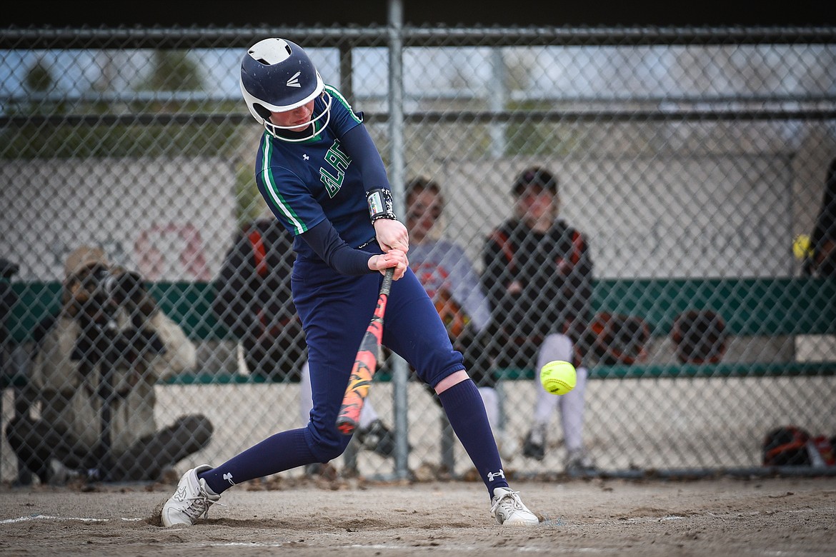 Glacier's Ella Farrell (12) connects on a grand slam in the second inning against Flathead at Kidsports Complex on Thursday, April 20. (Casey Kreider/Daily Inter Lake)