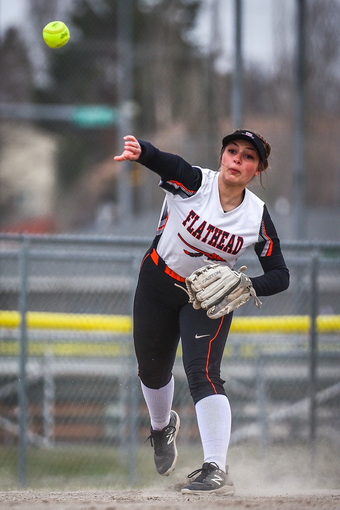 Flathead shortstop Reese Conley (17) throws across the diamond in the second inning against Glacier at Kidsports Complex on Thursday, April 20. (Casey Kreider/Daily Inter Lake)