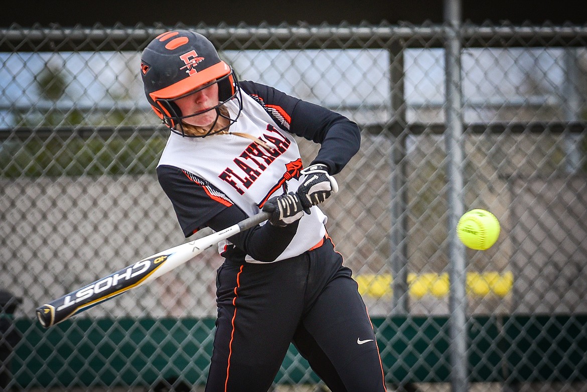 Flathead's Macey McIlhargey (3) drives in a run in the third inning against Glacier at Kidsports Complex on Thursday, April 20. (Casey Kreider/Daily Inter Lake)