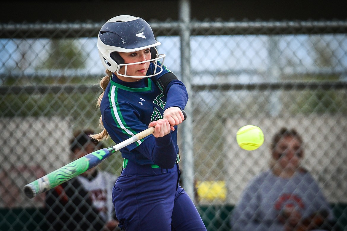 Glacier's Kenadie Goudette (2) connects on a leadoff double in the first inning against Flathead at Kidsports Complex on Thursday, April 20. (Casey Kreider/Daily Inter Lake)