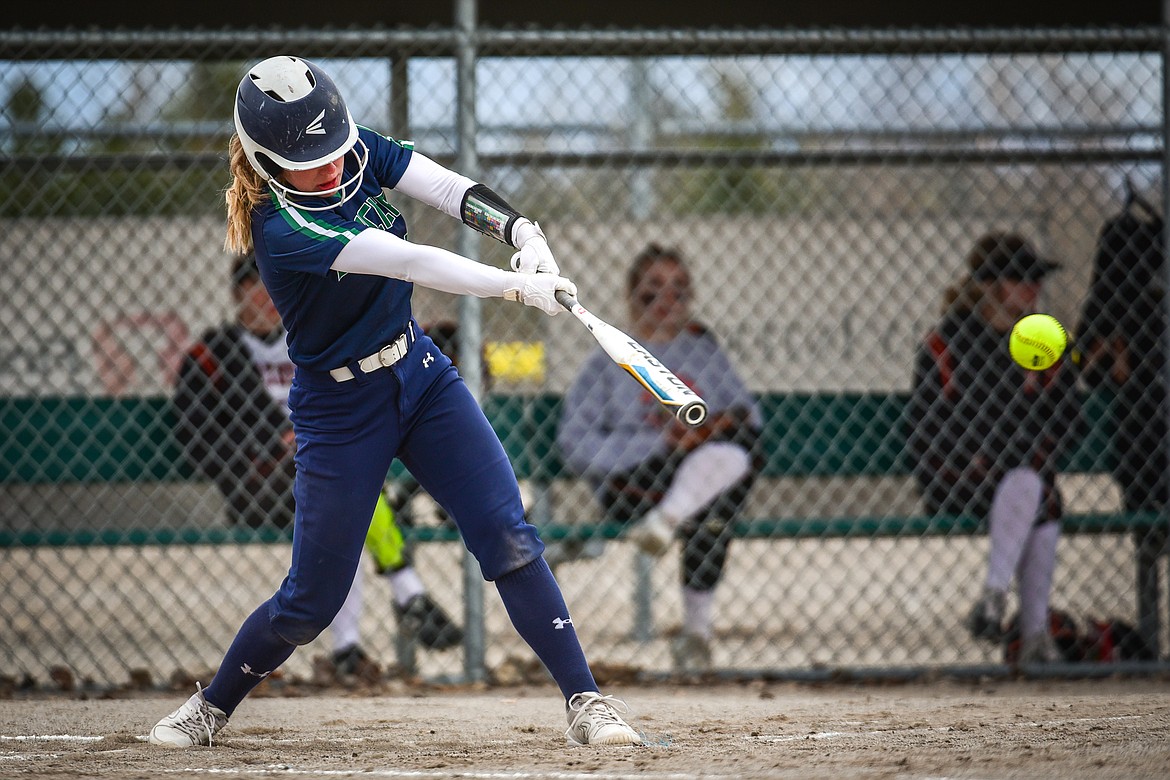 Glacier's Nakiah Persinger (8) connects on an RBI single in the first inning against Flathead at Kidsports Complex on Thursday, April 20. (Casey Kreider/Daily Inter Lake)